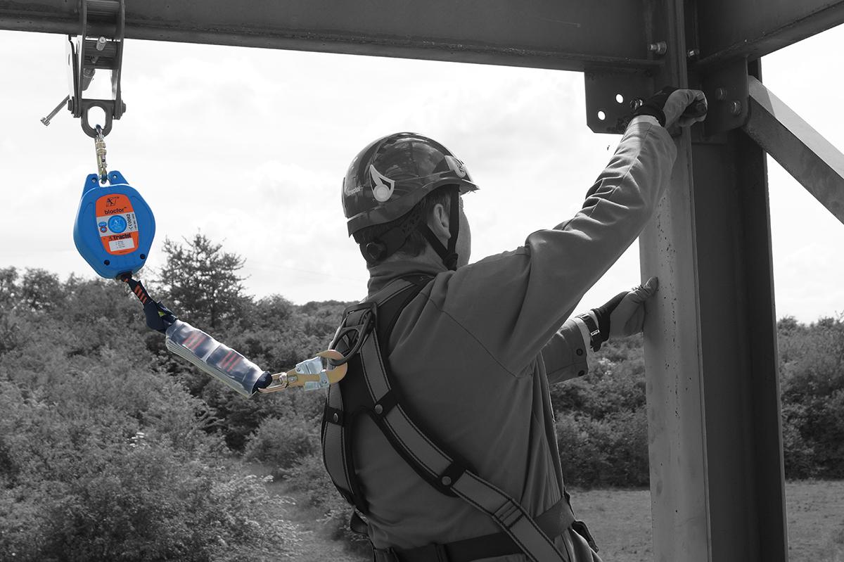 Fall arrest safety line system for industrial maintenance access