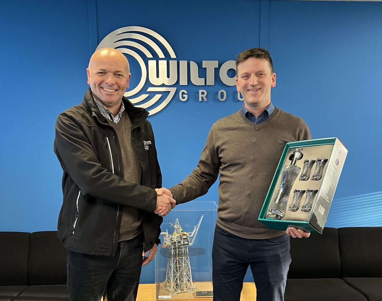 Paul Gardiner presenting a commemorative gift to Steve Pearson of Wilton Engineering