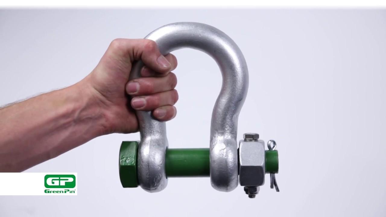 Green Pin lifting shackle held by hand